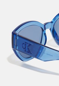 Calvin Klein Jeans Gafas de sol - transparent azure