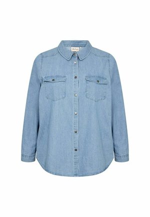 Svetlo modra denim srajca z ovratnikom, dolgimi rokavi, dvema žepoma na prsih in kovinskimi gumbi na zapiranje. Ima ukrivljen rob in sproščen kroj.