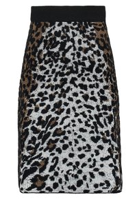 Stickad kjol med leopardmönster, som har en svart midja, vit botten och bruna-svarta fläckar, med en figurnära och slät textur.