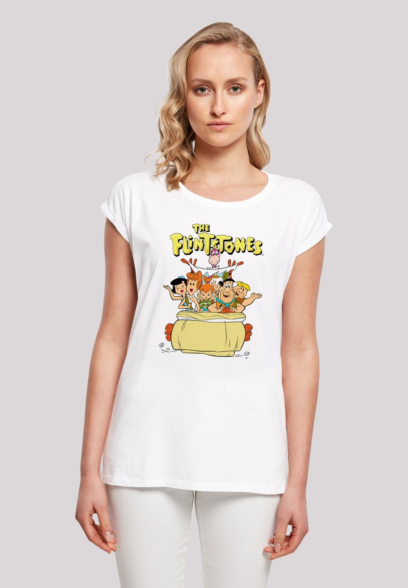 Hvit bomull T-skjorte med grafikk av "The Flintstones" tegneserien i lyse farger. Løs passform med oppbrettede ermer og rund halsdesign.