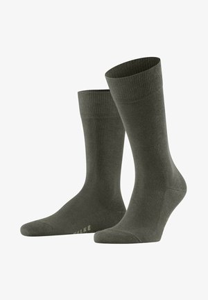 Olivgrüne knöchellange Socken aus weichem Stoff, mit elastischen Rippbündchen und glatter Oberfläche, verstärkter Zehen- und Fersenbereich.