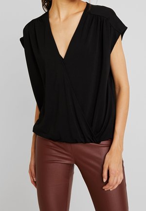 Blusa - black