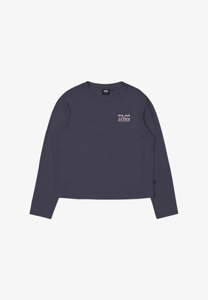 Långärmad, croppad T-shirt i marinblå bomull. Har en framsidesgrafik i rosa med texten "TACO" och "SOULED YOUR FEELING."