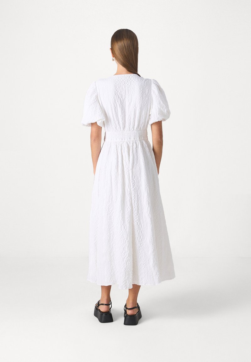 white dresses with bows XiRENA Lennox Dress in White main image 1