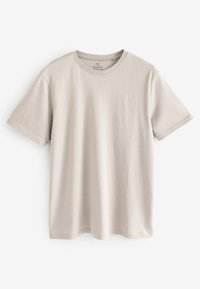Helles beige T-Shirt mit kurzen Ärmeln aus Baumwolle, das einen Rundhalsausschnitt und eine reguläre Passform aufweist, mit glatter Oberfläche und ohne sichtbare Muster.
