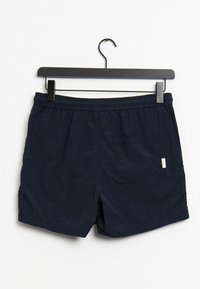 Shorts de bain bleu marine avec une taille élastique, une seule poche arrière et une petite étiquette de marque sur le côté droit. Tissu texturé.