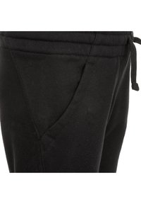 Nike Sportswear CLUB PANT - Träningsbyxor - black