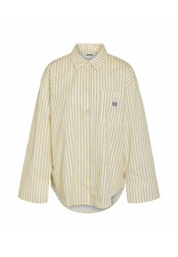 Kollane ja valge triibuline särk, millel on nööbid, pikad varrukad, rinnatasku ja ümar hem. Valmistatud kergest kangast.