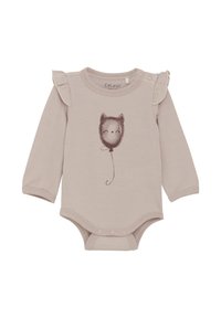 Långärmad bodysuit i ljus beige med volangdetaljer på axlarna och en illustration av en leende kattballong i brunt. Knäppning i botten.