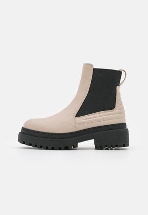 Enkellaarsjes met plateauzool - beige