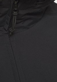 Carhartt WIP Mezisezónní bunda  - black
