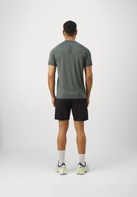 Björn Borg ESSENTIAL ACTIVE SHORTS - Calções desportivos - black beauty
