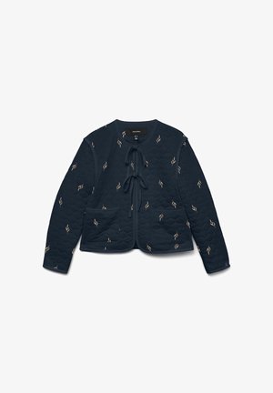 Pītā tumši zila jaka ar auklu aizdari, divām priekšējām kabatām un visā jaku rotājošiem bēšiem lapu motīviem. Garas piedurknes un apaļa kakla izgriezums.