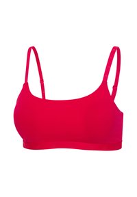 Sujetador inalámbrico rojo brillante con tirantes finos ajustables y un diseño liso y sin costuras sobre un fondo blanco.