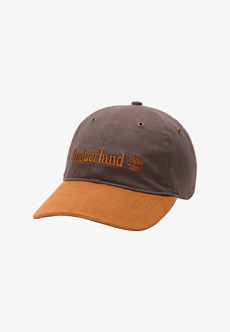 Casquette de baseball Timberland marron et beige avec logo brodé et œillets de ventilation sur les panneaux supérieurs.