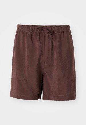 Brown, lightweight shorts with an elastic waistband and drawstring. Features side pockets and a smooth, slightly glossy texture.