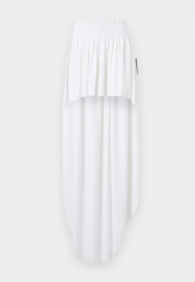 Λευκή φούστα με ψηλή μέση και ελαστική μέση, με σχεδιασμό σε στρώσεις και ασύμμετρο τελείωμα, που παρουσιάζεται σε ανοιχτό γκρι φόντο.