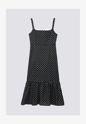 Must mustriline polka dot kleit, millel on reguleeritavad rihmad, istuv rinnus ja volangiga äär. Valmistatud kergest kangast, millel on valged polka täpid.