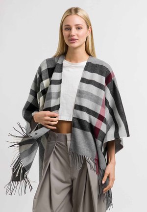 Grau und schwarz karierter Poncho mit fransigen Kanten. Weicher Stoff, lockerer Schnitt, mit horizontalen Streifen und einem weinroten Akzent.