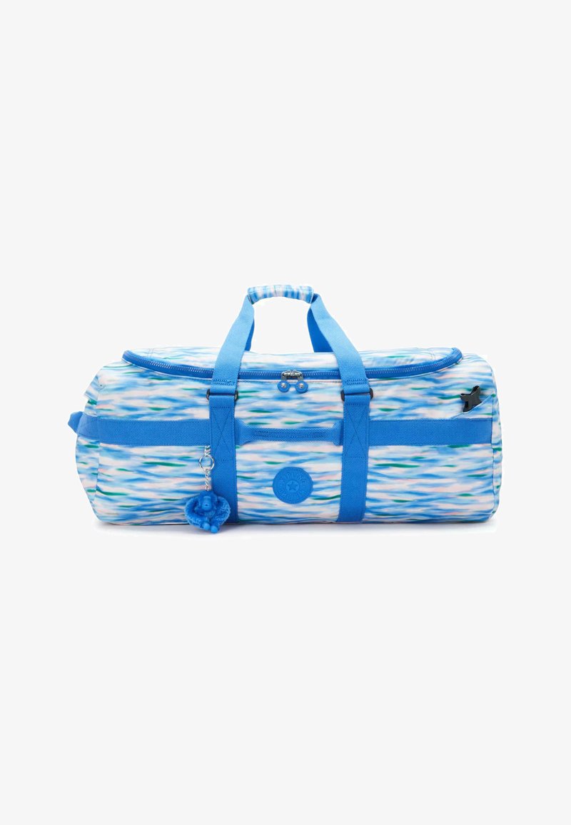 Säkkiluokka sinisessä ja valkoisessa aaltoilevassa kuviossa, jossa on kaksi sinistä kahvaa, vetoketjusulku ja sininen koriste.