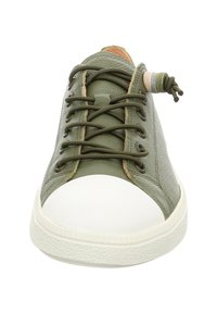 Green leather sneaker with white rubber toe cap and sole. Features textured surface, prominent laces, and a unique tab detail at the heel.