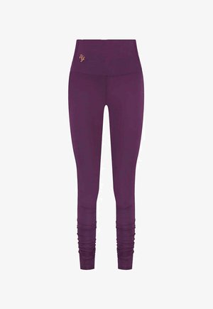 Violett leggings med hög midja, prydda med en subtil logo i guld, en smidig, stretchig design och rynkade detaljer vid anklarna.