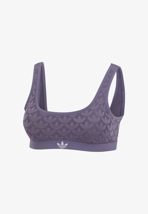 Brassière de sport violette avec un design contourné, présentant un motif texturé de feuilles et un accent de logo blanc sur la ceinture. Bretelles larges pour un meilleur maintien.