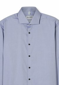 Light blue shirt with a subtle geometric pattern, button-up front with black buttons, structured collar, and a tailored fit.