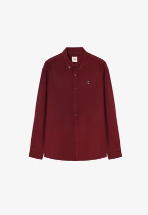Burgundy long-sleeve shirt with a button-down collar, featuring a small embroidered logo on the chest and front button closure.