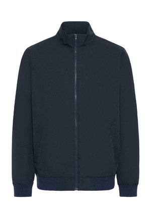 Marineblauwe jas met ritssluiting, opstaande kraag, twee zijzakken, geribbelde manchetten en geribbelde zoom.