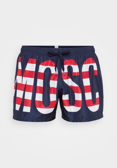 Navy swim shorts with large white letters spelling "MOSC" and red horizontal stripes; features a drawstring waistband and lightweight fabric.