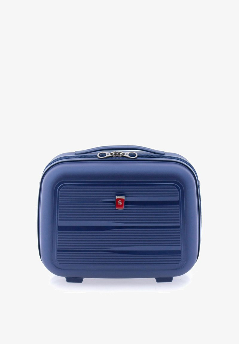 Funda de viaje rígida azul con surcos horizontales, un acento de logo en la parte frontal y un mango de cremallera plateado. Diseño compacto para un manejo fácil.