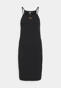 Zwart mouwloos jurkje met dunne bandjes, gemaakt van een gladde stof. Heeft een gouden Nike-logo gecentreerd boven de buste. Aansluitende silhoeutte.