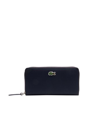 Portafoglio zip blu navy con superficie testurizzata, logo coccodrillo verde e zip in metallo argentato. Interno spazioso per carte e contanti.