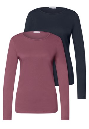 Deux t-shirts à manches longues et col rond, un mauve devant et un noir derrière, présentés sur un fond blanc uni.