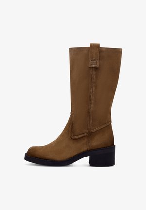 Brown suede knee-high boot with a smooth texture, rounded toe, and block heel. Features a side seam and a small strap at the top.