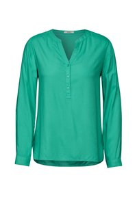 Blusa verde a maniche lunghe con una texture morbida, scollatura a V, pattina con bottoni e polsini arrotolati. Tessuto uniforme e design morbido.
