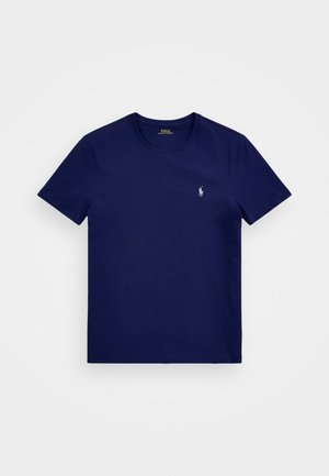 Granatowy T-shirt z krótkim rękawem i okrągłym dekoltem z małym białym logo konia Polo Ralph Lauren na lewej piersi.
