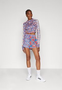 adidas Performance FARM SHORTS - Sportiniai šortai - bright red/signal cyan