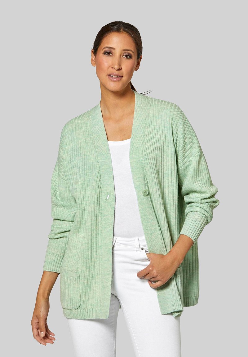Groene geribde cardigan met een relaxed fit, voorzien van een sjawlboord, twee voorzakken en een enkele knoopsluiting. Lichtgewicht gebreide textuur.