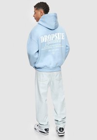 Dropsize OVERSIZE  STUDIOS  - Sweat à capuche - baby blue