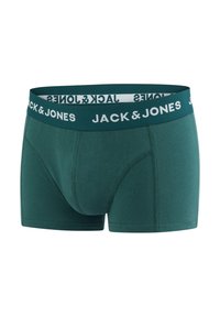 Green cotton boxer shorts with a contrasting navy elastic waistband featuring white "JACK & JONES" text, and a close-fitting design.