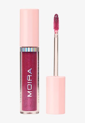 Glossy pink lip gloss with glitter in clear tube labeled "MOIRA" next to applicator wand with pink cap and glittery product on tip.