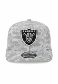 Gray camo cap featuring a black Raiders logo on a shield patch. Adjustable strap with a rounded brim and textured fabric.