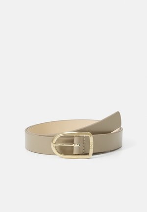 Beige leather belt with a gold-tone metal buckle, smooth texture, and a minimalist design. The belt is flat and adjustable.