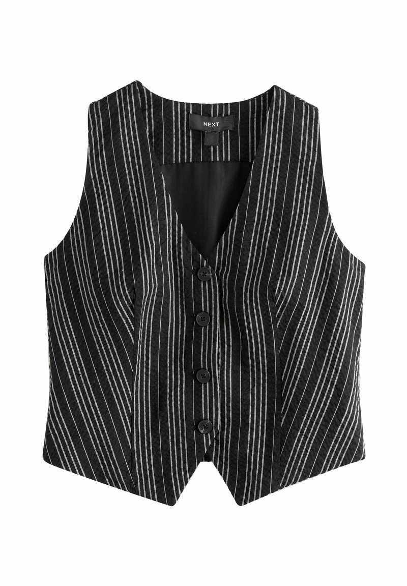 Svart väst med vertikala vita ränder, v-ringning, fem knappar framtill och tapered design. Tillverkad av strukturerad tyg.