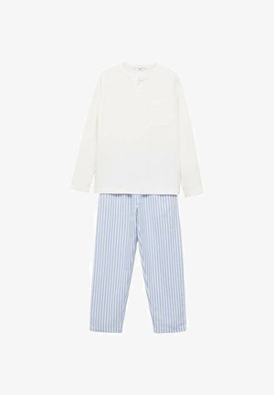 Haut blanc à manches longues avec une poche, associé à un pantalon rayé bleu et blanc. Tissu léger, coupe décontractée et motifs contrastés.