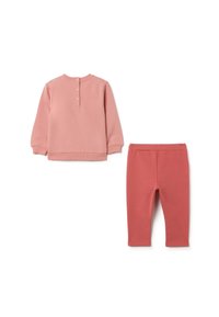 Camiseta rosa de manga larga con tapeta de botones y leggings rosa a juego. Ambos hechos de una tela suave y elástica con una textura suave.