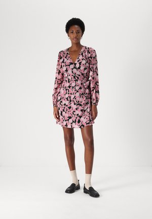 Black dress with a floral pattern in pink and green. Features a V-neckline, long sleeves with puffed shoulders, and a relaxed fit.