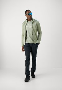 Peak Performance ORIGINAL TEE - Triko s potiskem - limit green